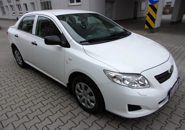 Toyota Corolla cena 17900 przebieg: 206000, rok produkcji 2007 z Warszawa małe 121